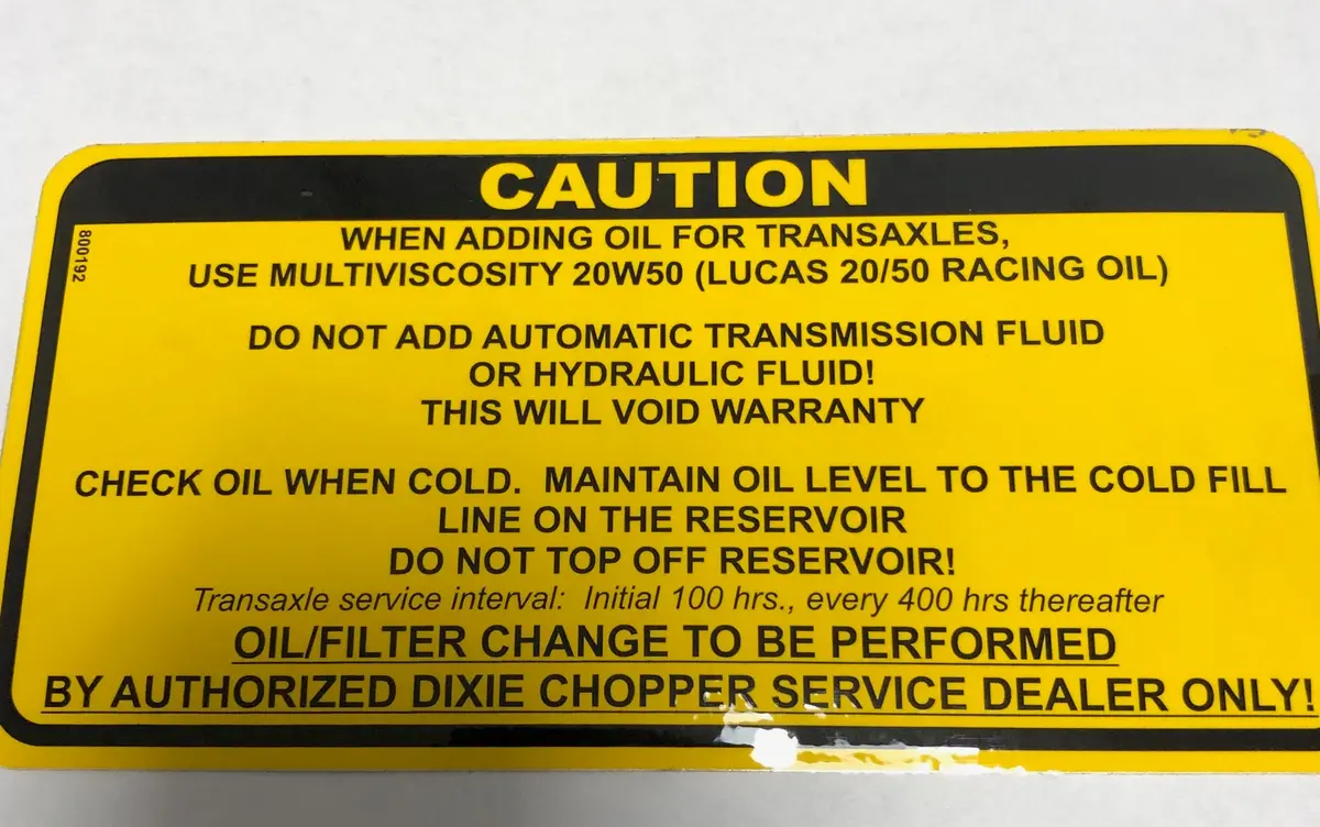 800192 Decal Caution Oil Dixie Chopper 1